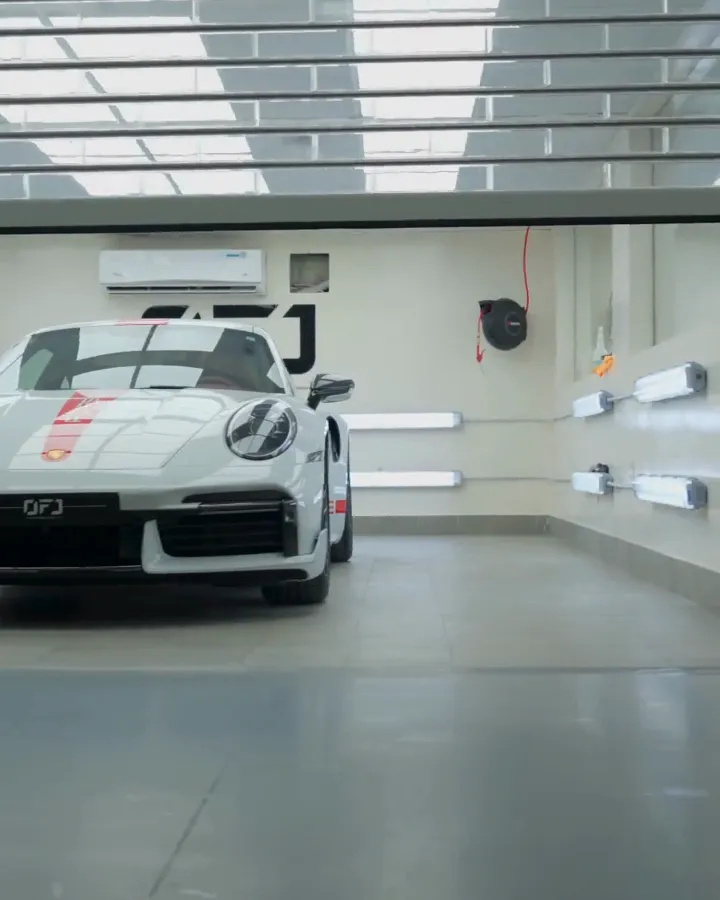 White Porsche 911 in the OFJ Automotive bodyshop, Dubai