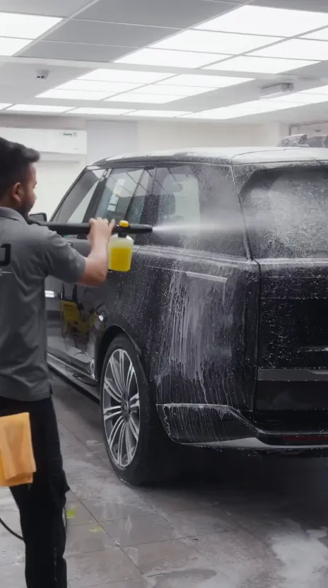 OFJ installer fitting paint protection film on a Range Rover in Al Quoz, Dubai